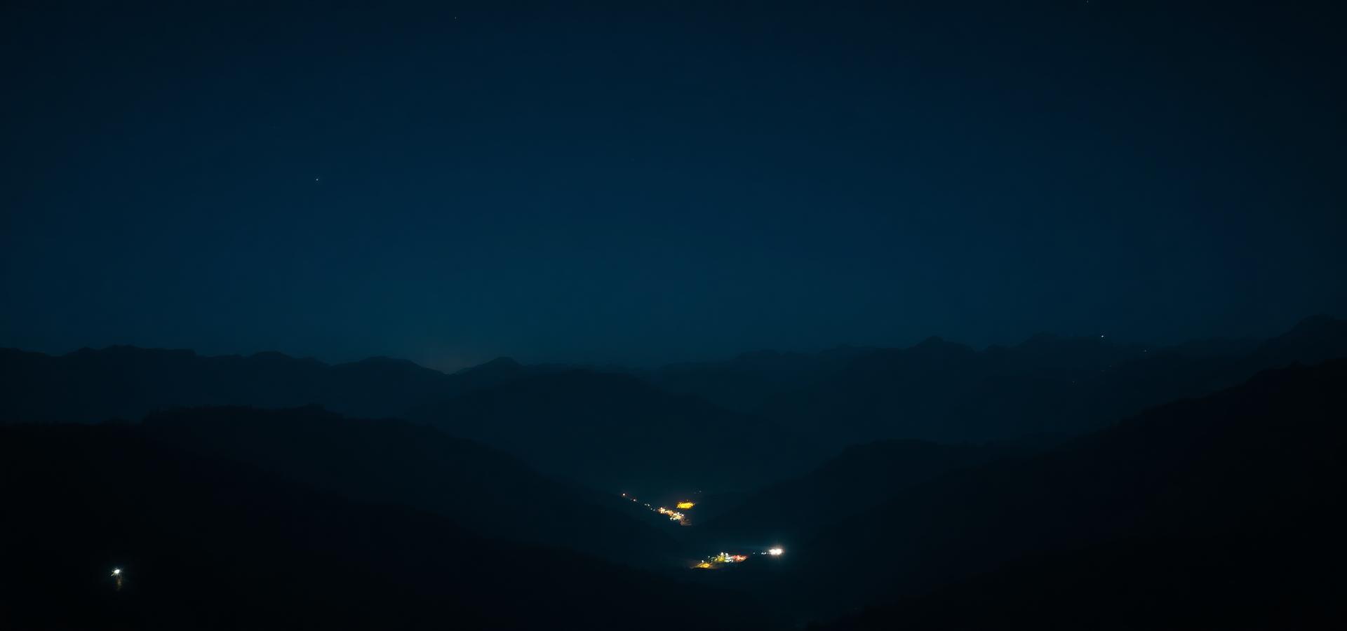 Night sky over a Himalayan mountain range